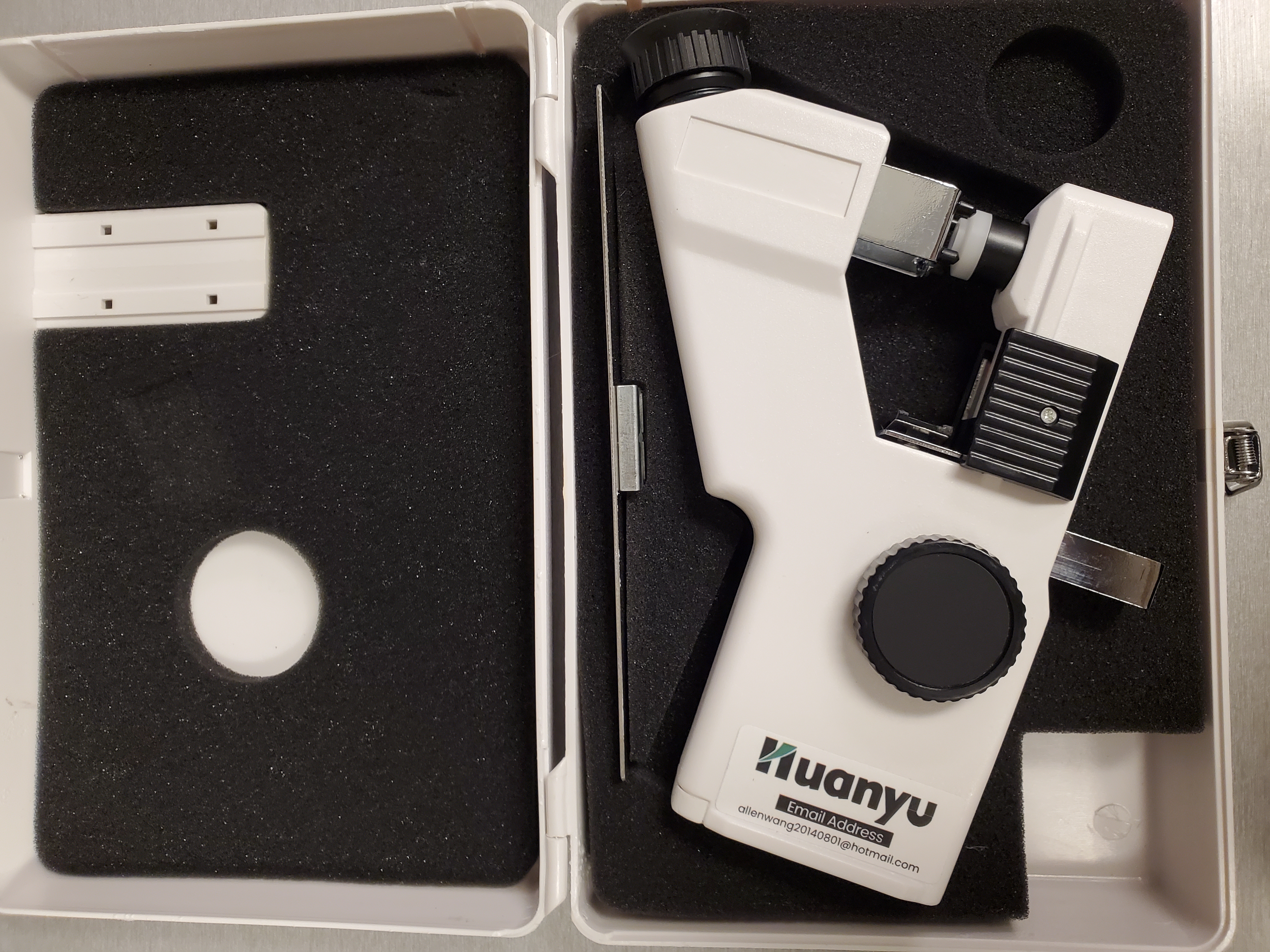 2. Open the case to find the tools inside.